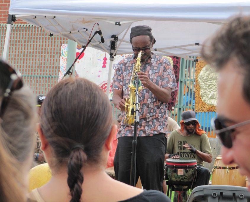 Festival For All Skid Row Artists, 2015 – Garry Brown performing in the shirt he designed, picture by Austin Hines.